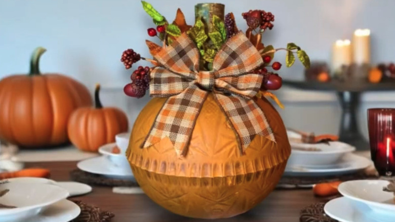 A DIY project using punch bowls to create pumpkin decor