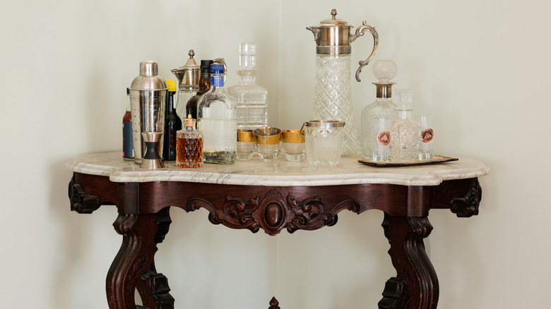 Antique marble top table being used as a bar