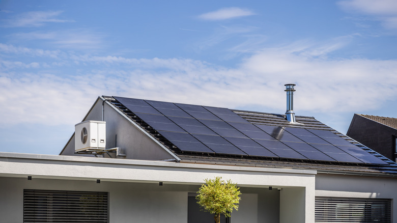 The roof of a modern home with installed solar panels
