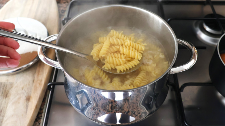 Cooking pasta in a metal pot
