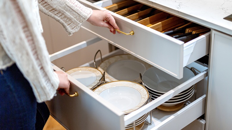 Kitchen drawers with dinnerware and flatware