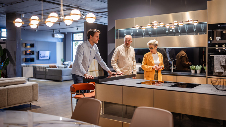 Cutsomers shopping in a kitchen showroom