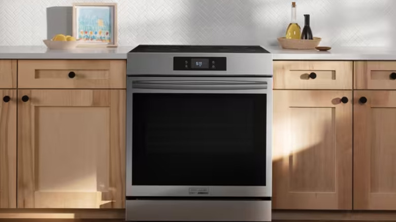 The Frigidaire Gallery 6.2 cu. ft. Induction Range in a kitchen with light color cabinets