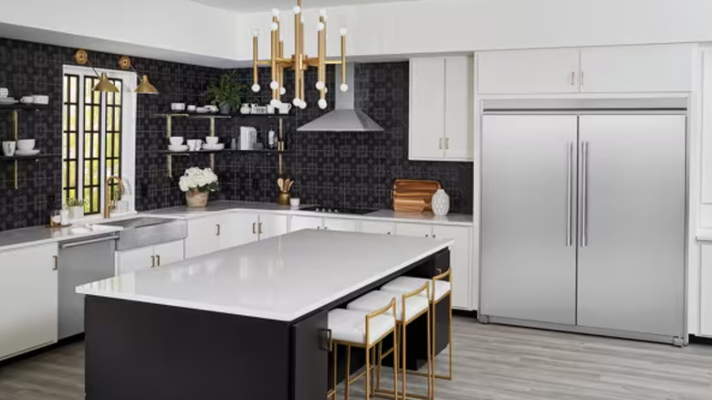 The Frigidaire Professional 19 cu. ft. Single-Door Freezer with matching single-door refrigerator in an upscale kitchen