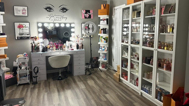 A glam room in a home with products organized on different shelves and cabinets