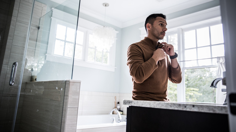 Man getting ready in the bathroom