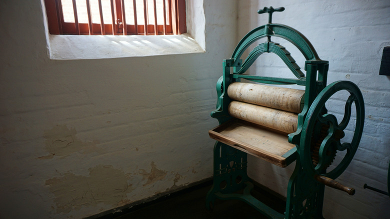 large green antique hand crank wringer or mangle