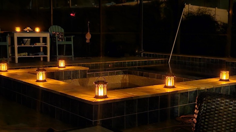 Kooper's Solar Lanterns arranged on an outdoor wall