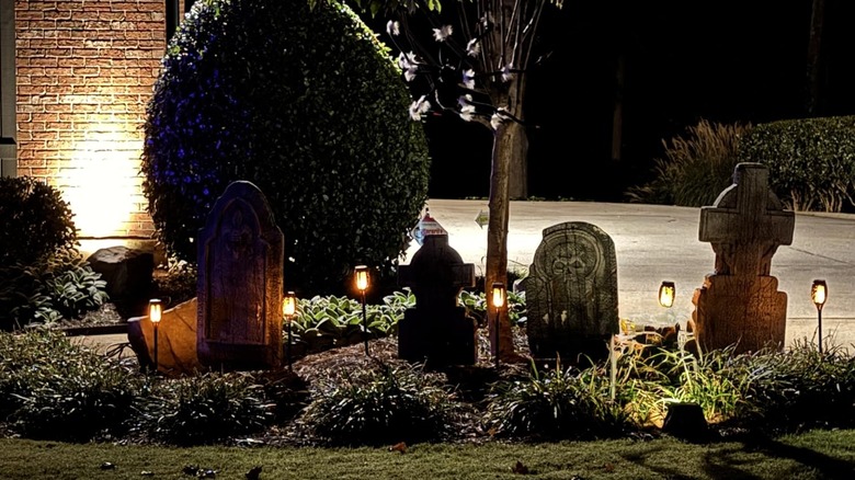 IkeeRuic's Solar Torch Lights used as part of a front-yard Halloween graveyard scene