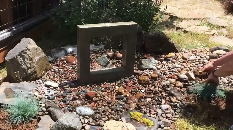 a DIY square concrete water fountain
