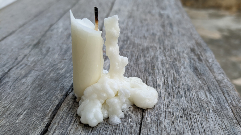 A melted, broken candle