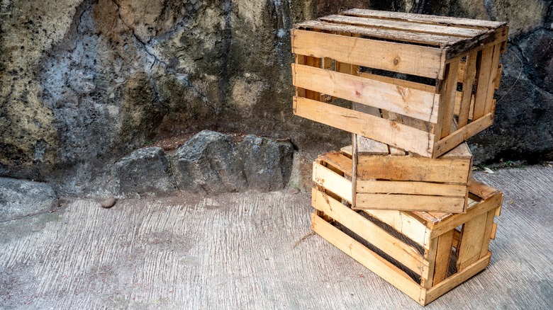 Three stacked wooden crates