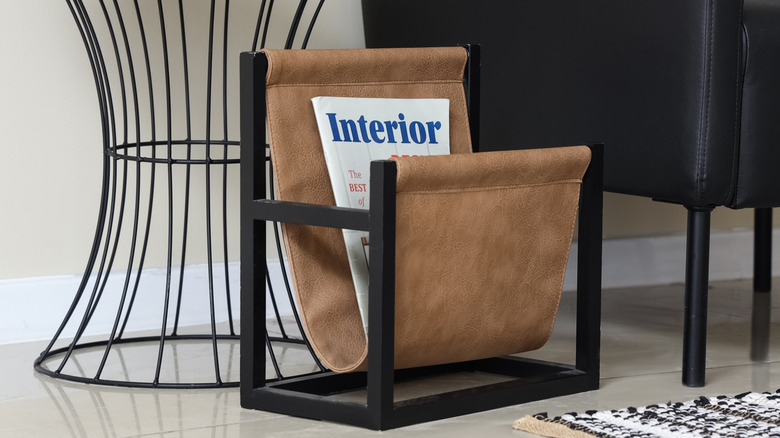 A leather magazine holder