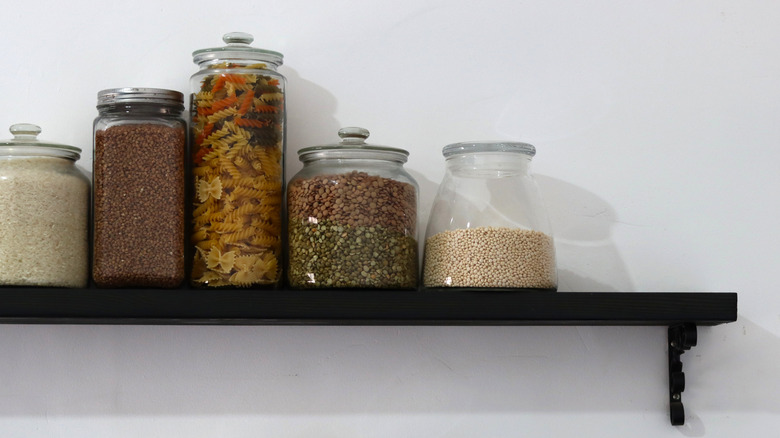 Glass jars on a shelf in the kitchen