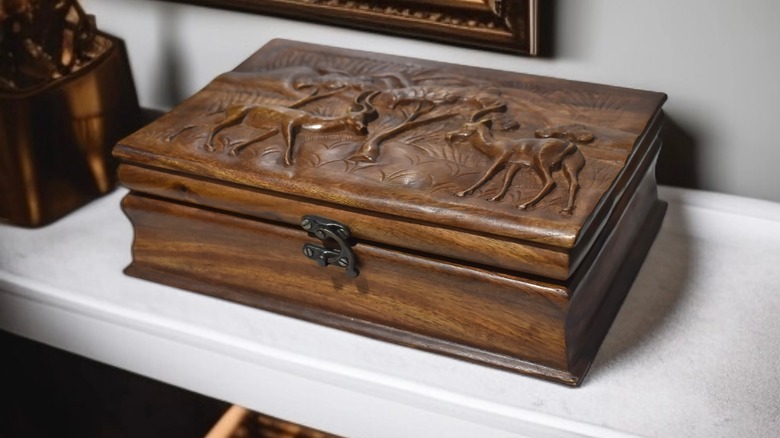 A carved jewelry box