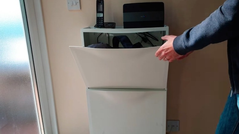 tilt out cabinet tech storage solution