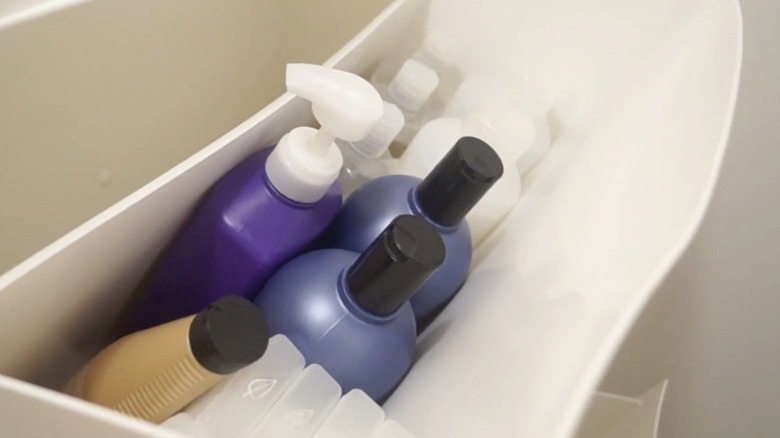 Shampoo and personal care items in a shoe cabinet