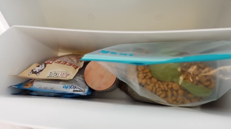 Pet food in a tilt out cabinet