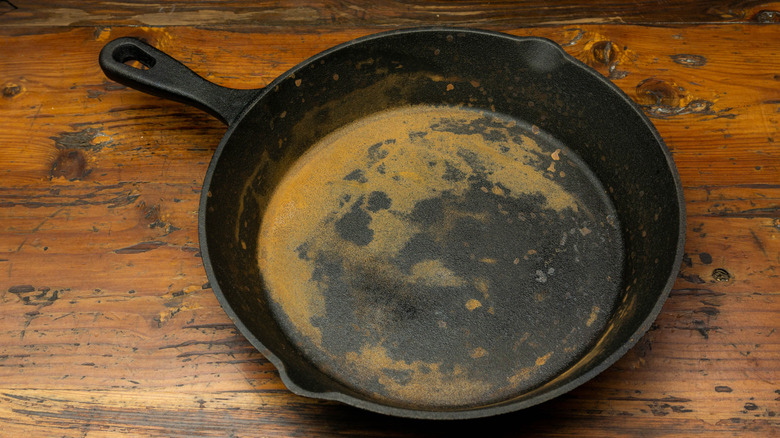 rusty cast iron pan