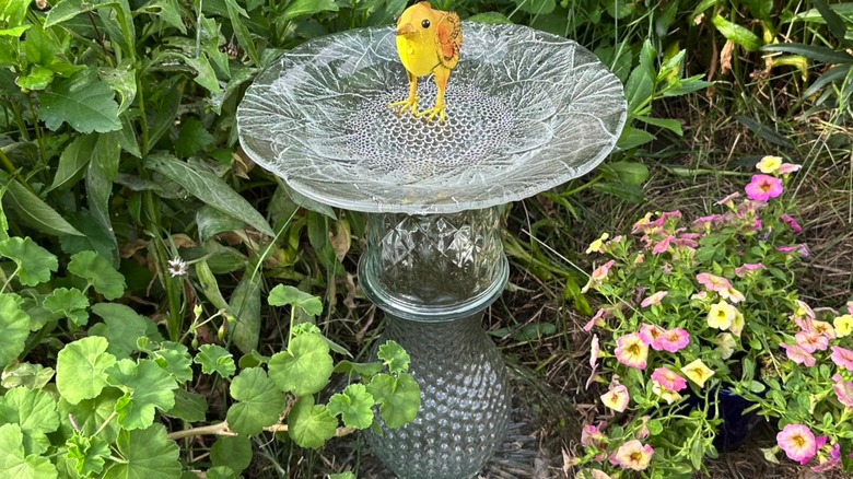 Upcycled birdbath made from glassware