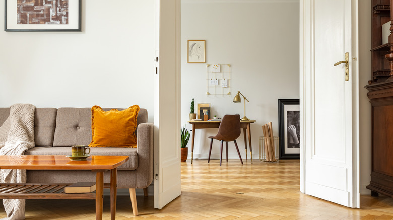 Open door between a living room and home office