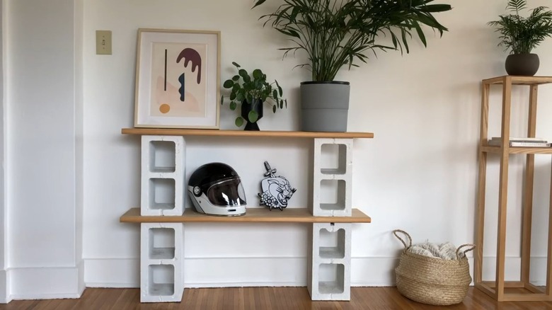 cinder block bookshelf with decor