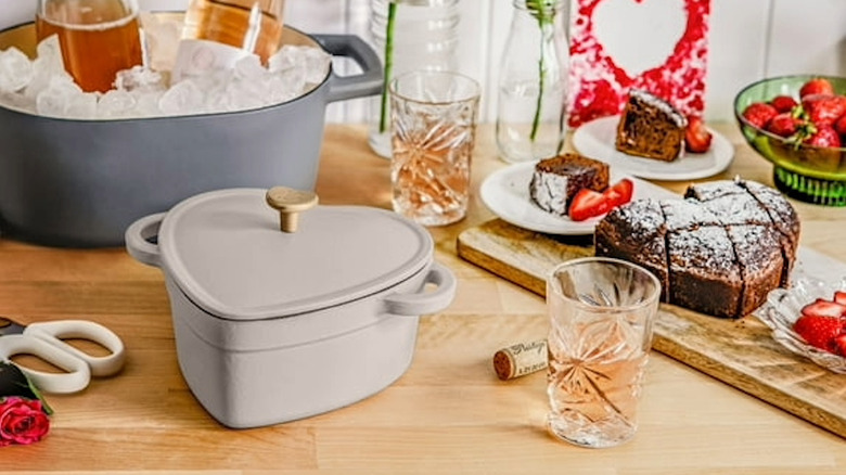A heart-shaped Dutch oven sitting on a countertop