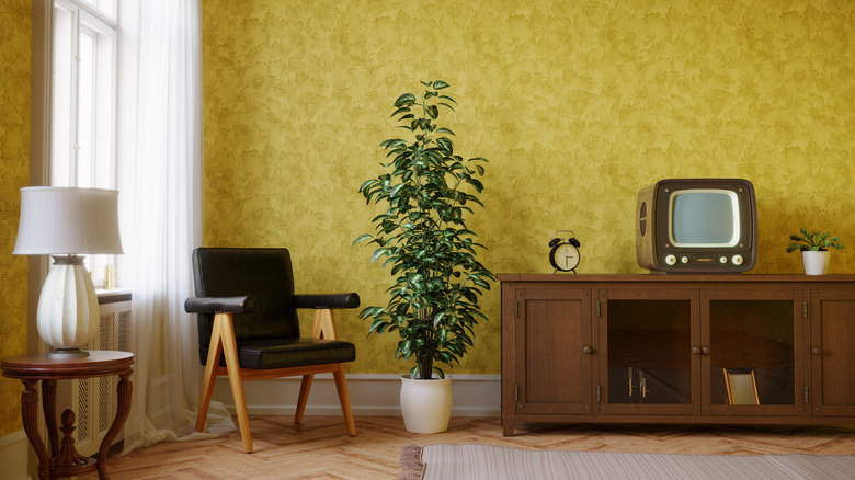 A retro-style living room with yellow wallpaper