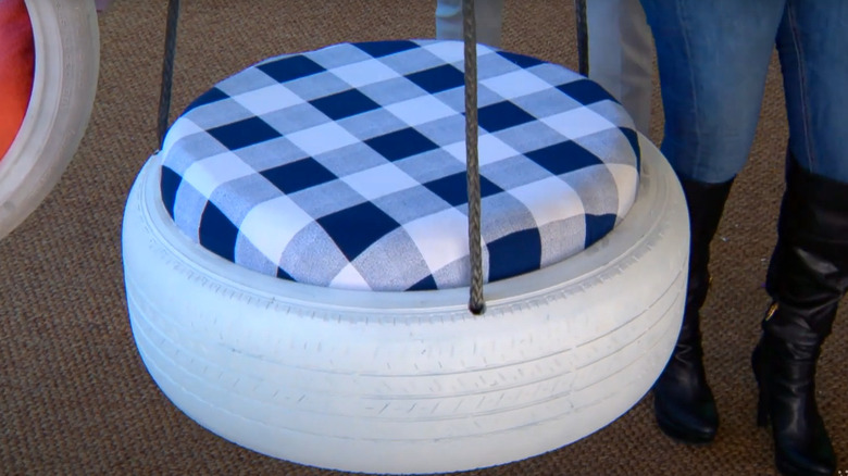 Cute hanging tire chair with blue and white plaid seat