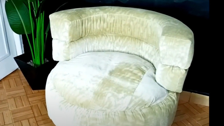 Plush tire armchair with round backrest in modern home
