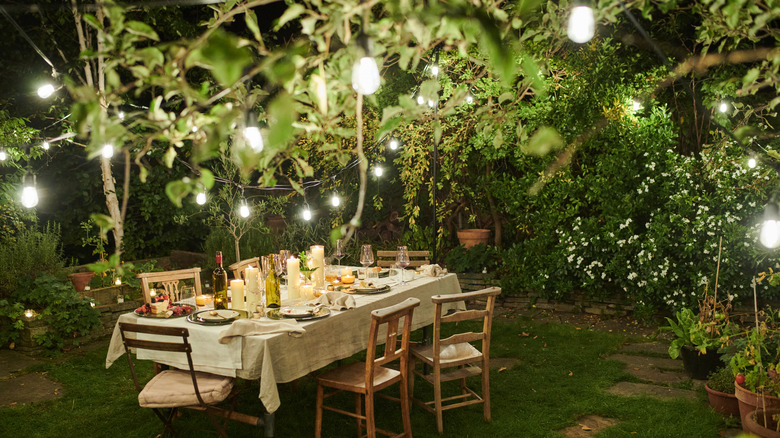 Outdoor table with candle centerpieces