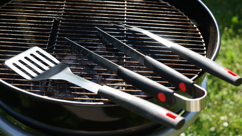 Grilling tools on a barbeque