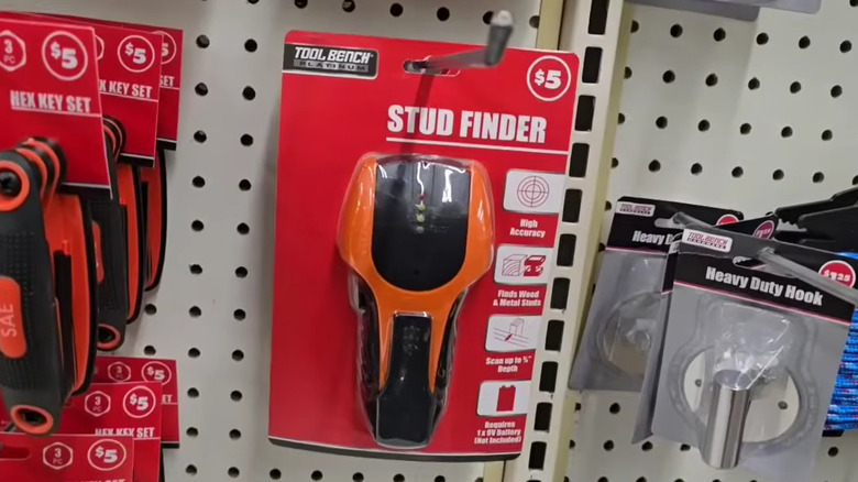 Dollar Tree stud finder hanging on store wall rack