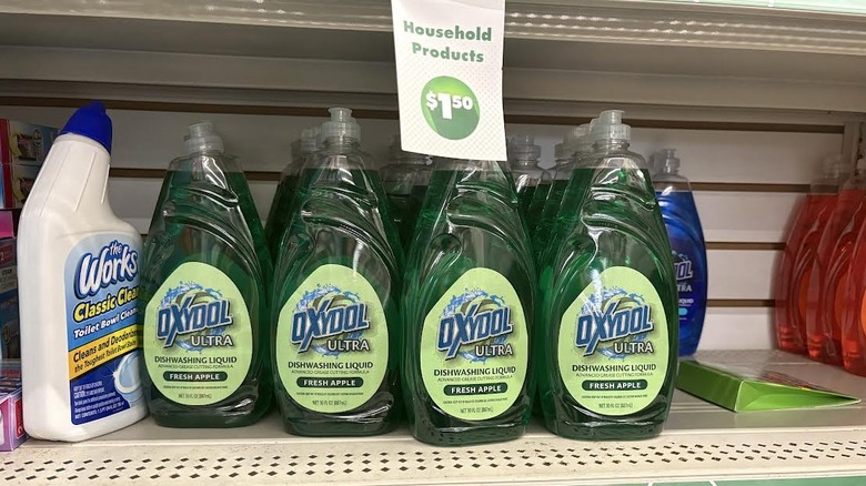 Dollar Tree Oxydol dishwashing liquid on a perforated store shelf