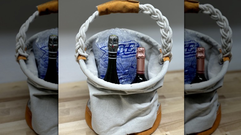 Using a canvas bag as wine bucket.
