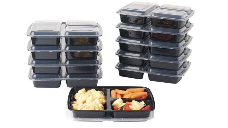 Stacks of three-compartment food storage containers from Aldi.