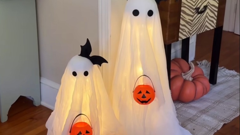 LED lit ghosts with pumpkins