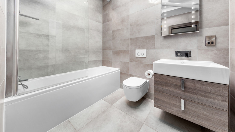 Modern bathroom finished with large format tiles