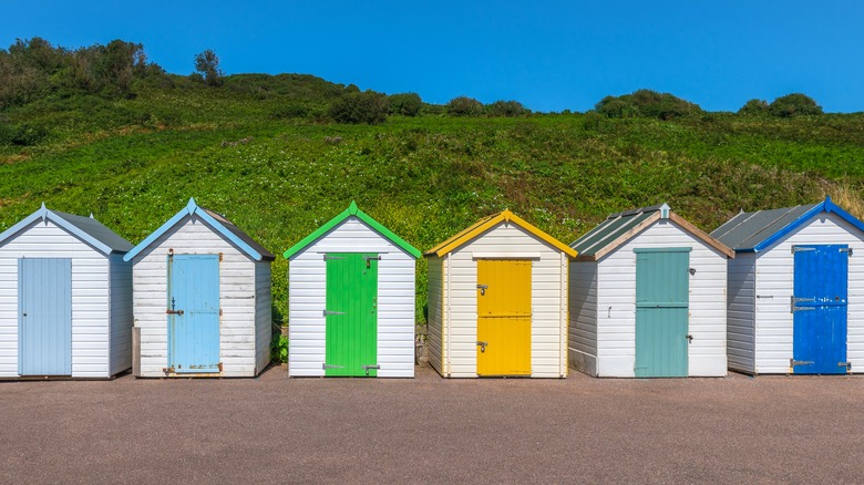 Row of tiny beach shacks