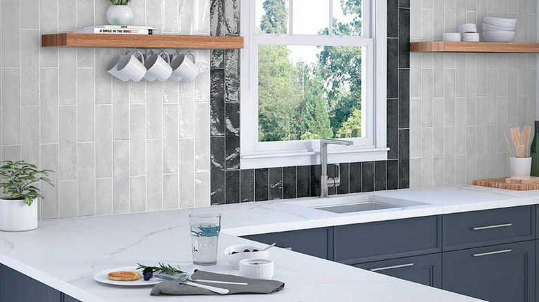 Nissel black and white brick tiles in a kitchen blacksplash