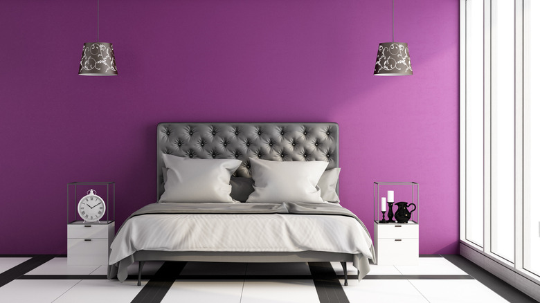 bedroom with vibrant purple wall