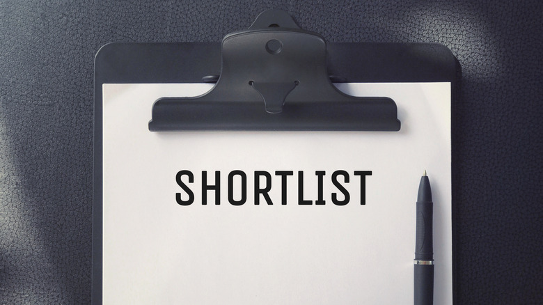 clipboard with shortlist written on it