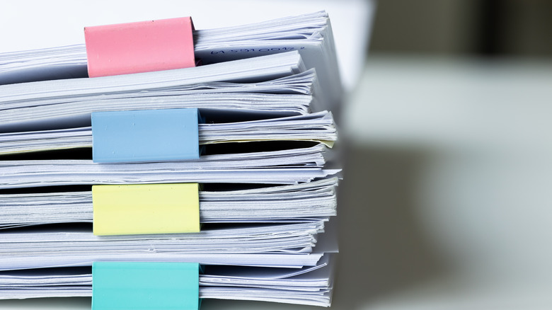 piles of stacked, white papers