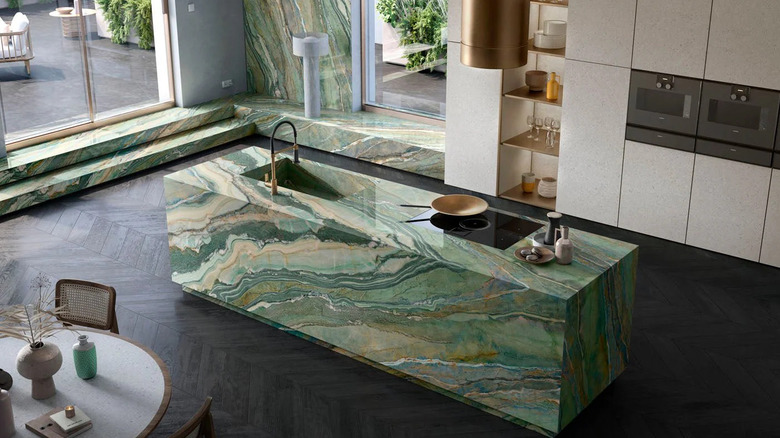 A stone island fully made from stone, which is also seen on the wall and as steps in the image