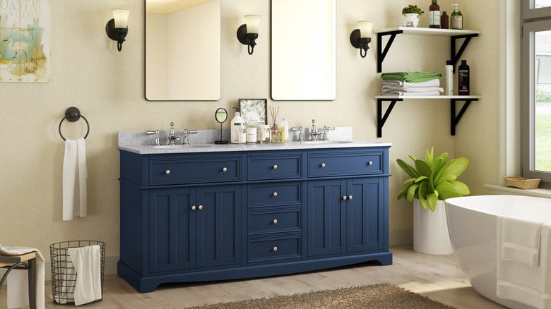 A luxury bathroom with a vanity from Home Decorators Collection