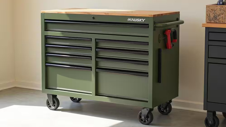 A mobile tool chest with wood countertop from Husky