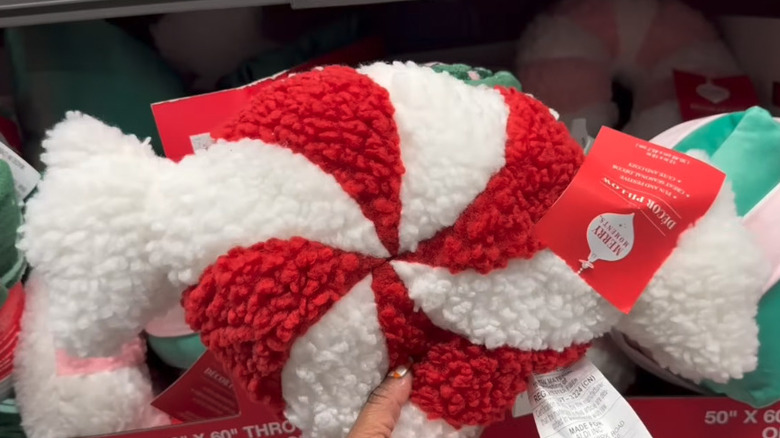 Aldi's candy cane-shaped bouclé throw pillow