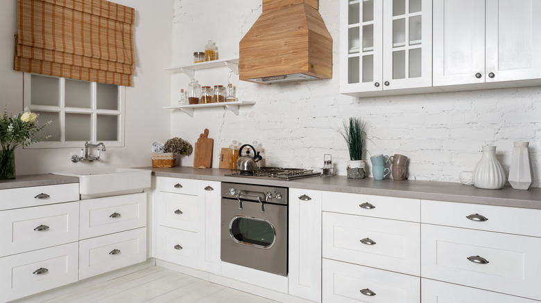 white and wooden organized kitchen