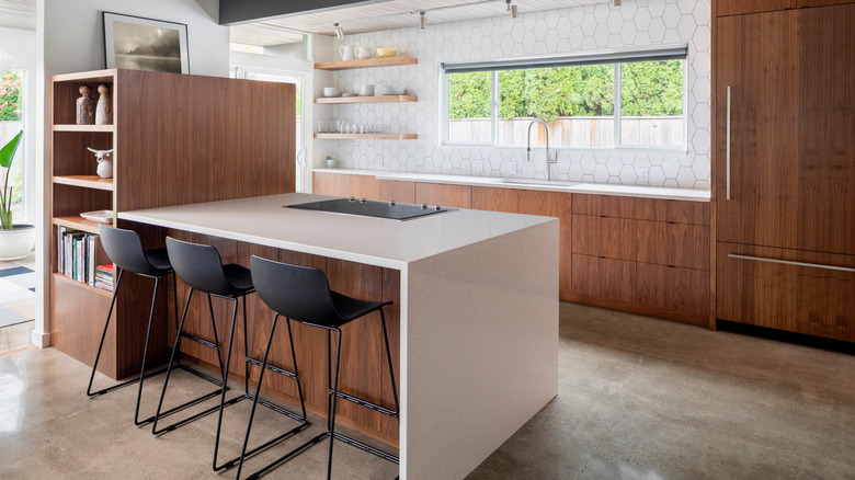 wood cabinets and white countertops