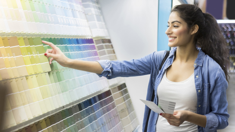 woman looking at paint samples